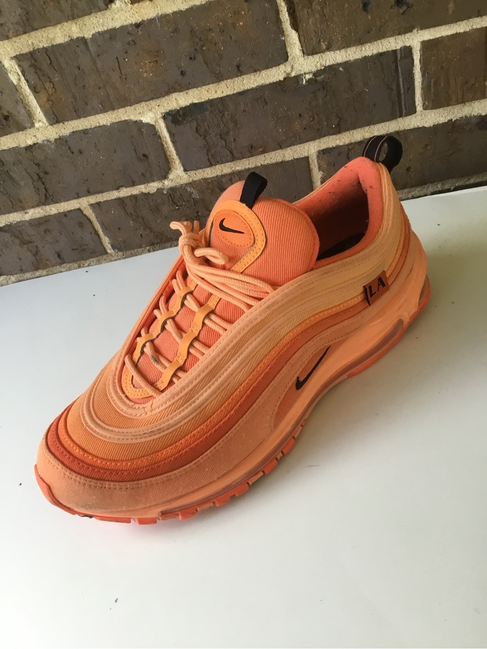 Nike Women’s Air Max 97 in Orange and Coral
